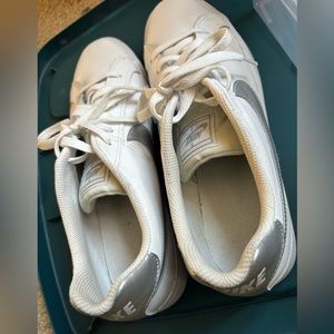White and silver nike sneakers